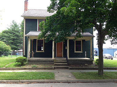 wood door, large front porch, sidewalk