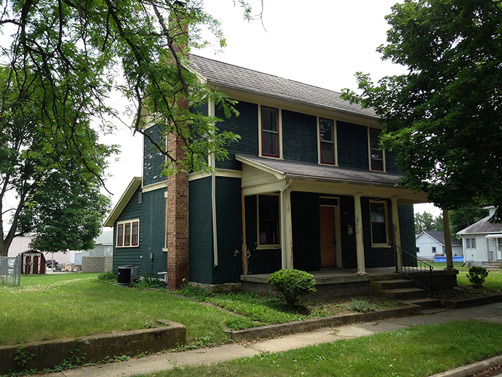 2 story, brick chimney, large front porch