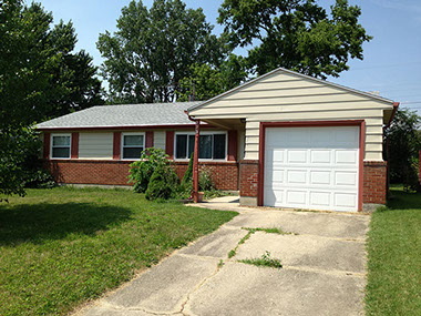driveway, attached garage, covered entry