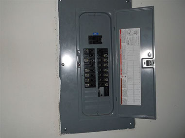 driveway, garage in rear, yellow brick