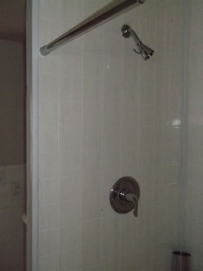 Cape Cod style, driveway, garage in rear