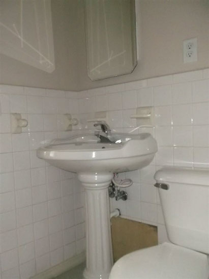 Cape Cod style, driveway, garage in rear