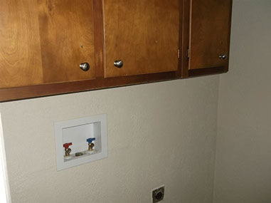 driveway, garage in rear, yellow brick