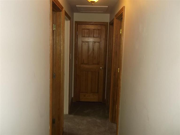 Cape Cod style, driveway, garage in rear