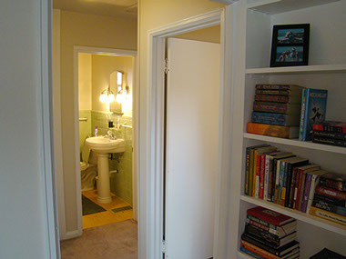 built-in book shelf, cream walls, white trim