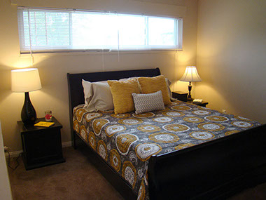 large clerestory window, queen bed, end tables