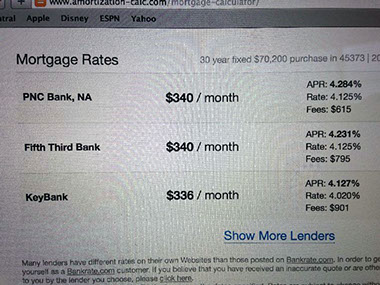 driveway, garage in rear, yellow brick